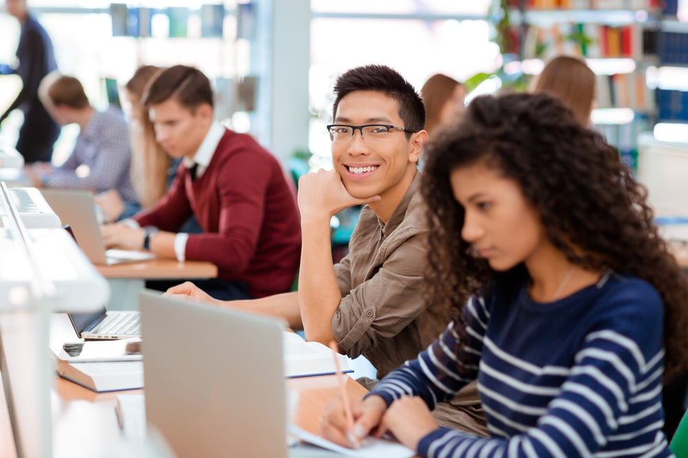 Group of a students studying in the university library